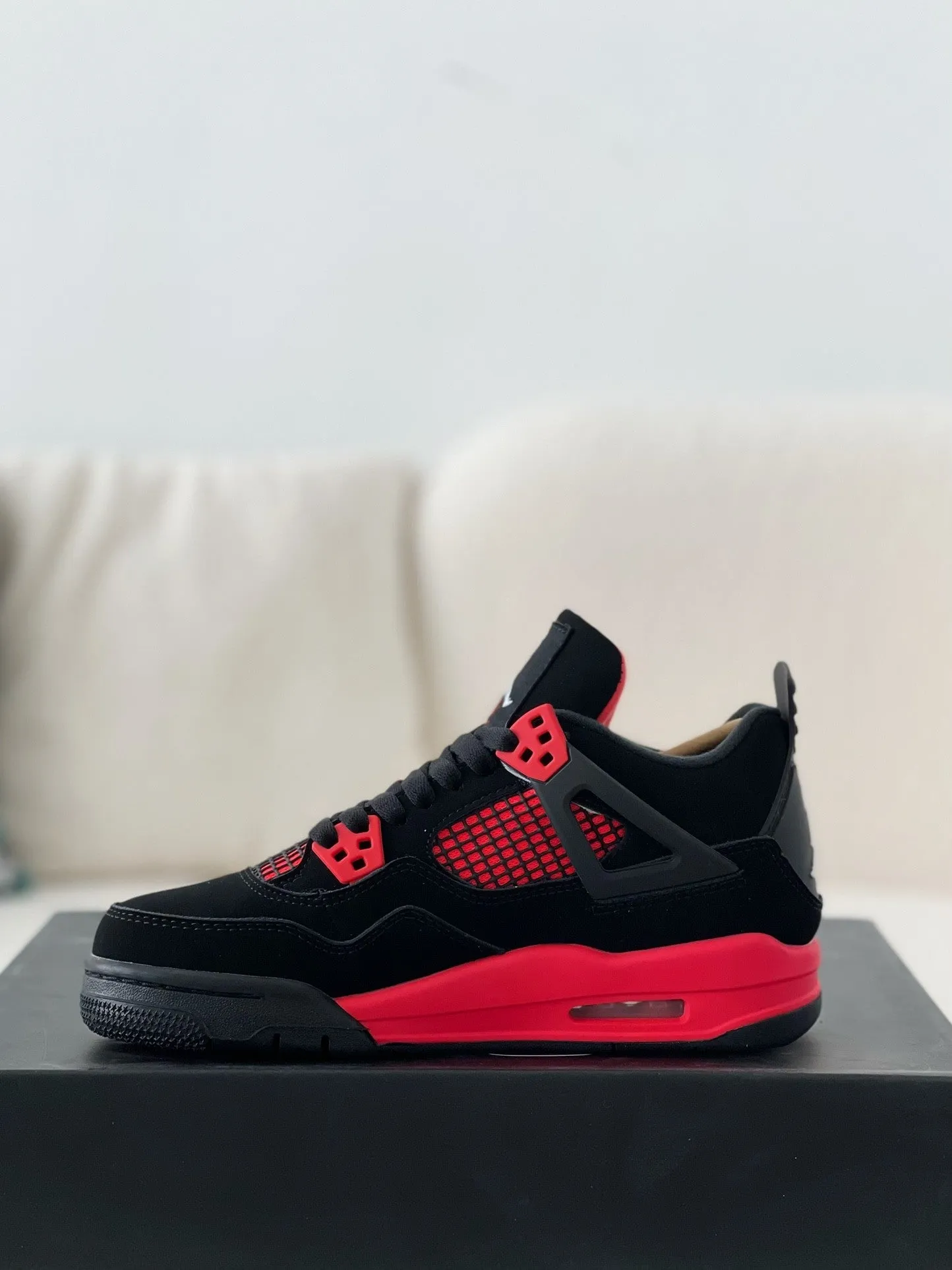 Air Jordan 4 Retro "Red Thunder"