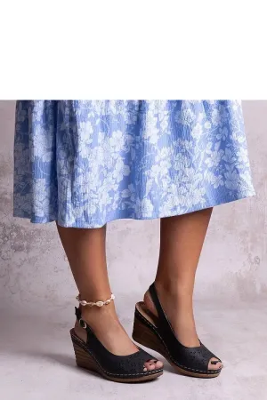 Black buskin wedge sandals